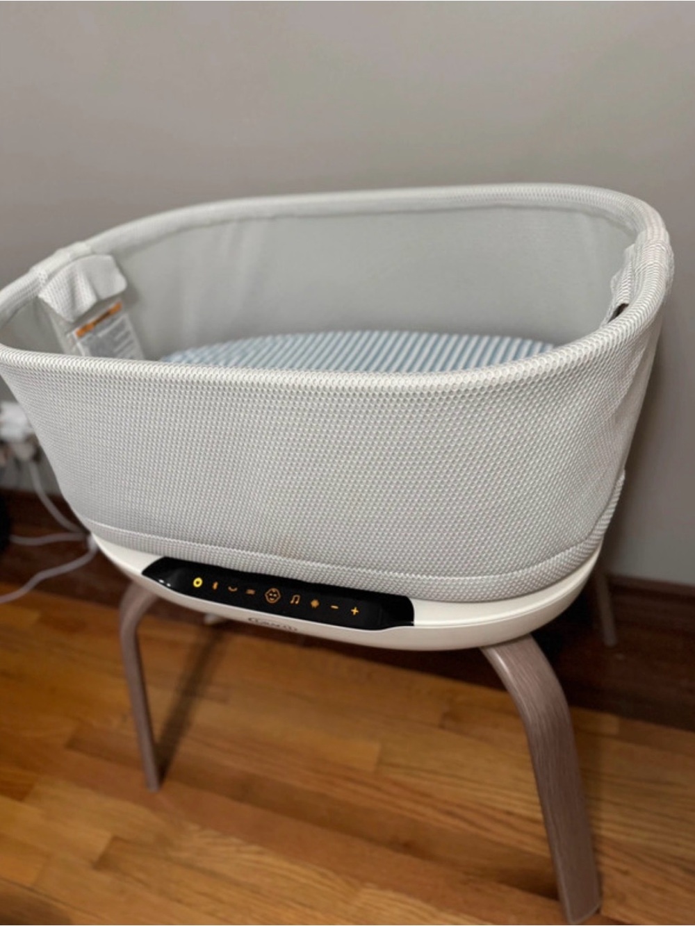 Modern White Fabric Baby Bassinet with Integrated Controls